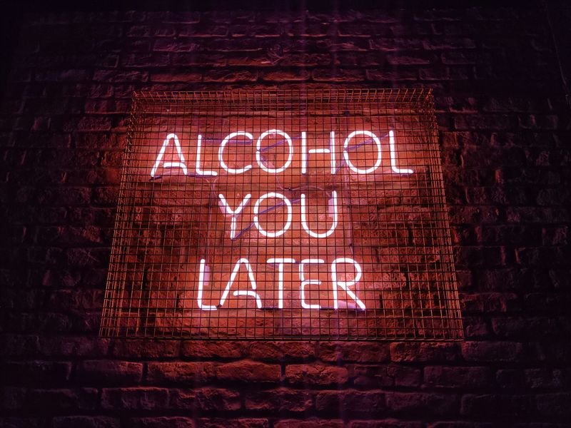 A neon sign that says, 