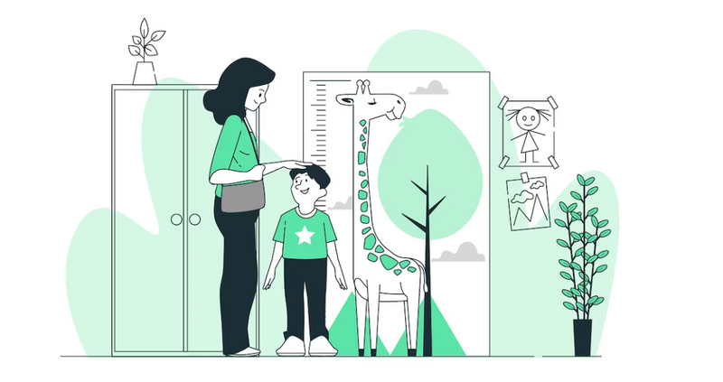 A smiling mother is hand-patting the top of smiling masculine-child's head next to a giraffe-shaped height chart in a class.