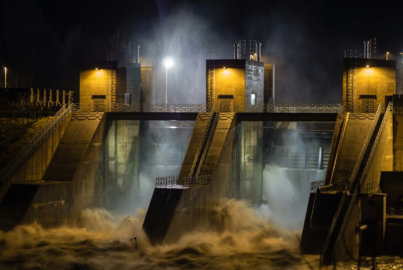 A night view of water discharge from small dam.