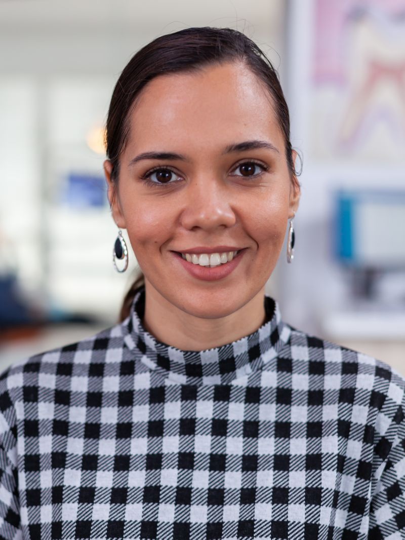 An image of a woman smiling.