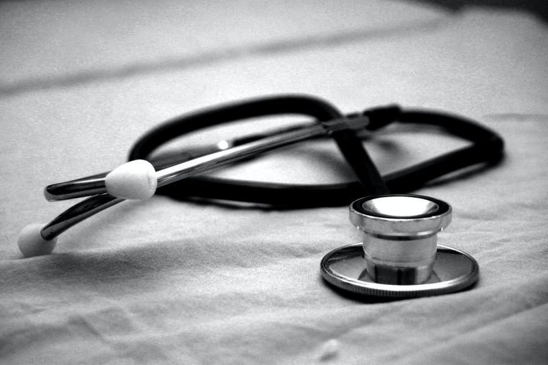 black and white photo of a stethoscope 