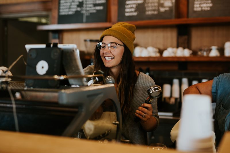 Woman working at a coffee shop