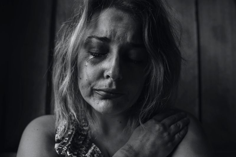 A woman crying.
