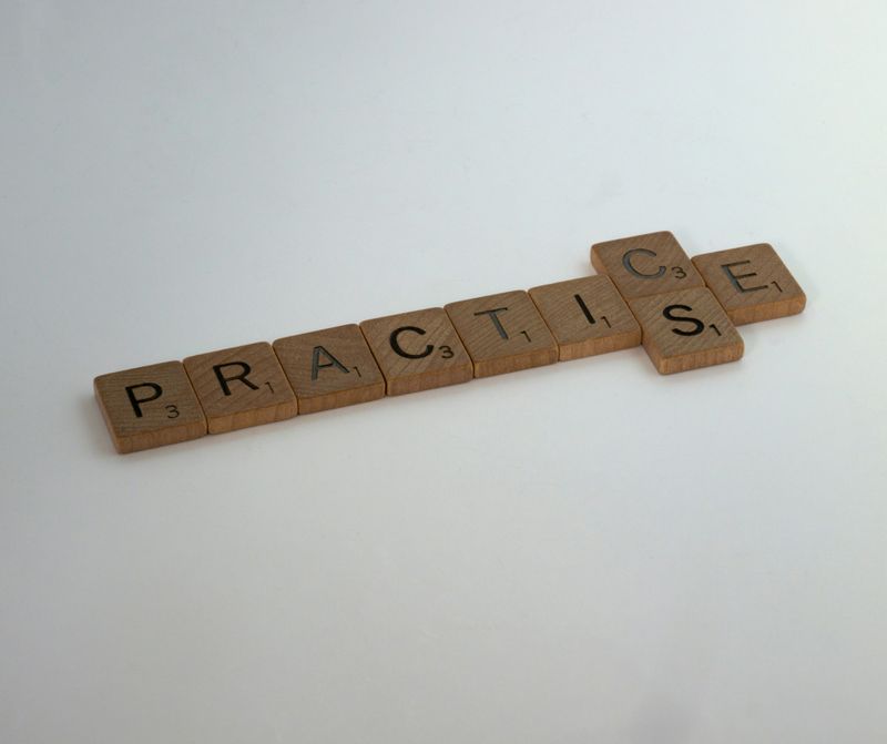 Scrabble letters on a white background spelling out the word