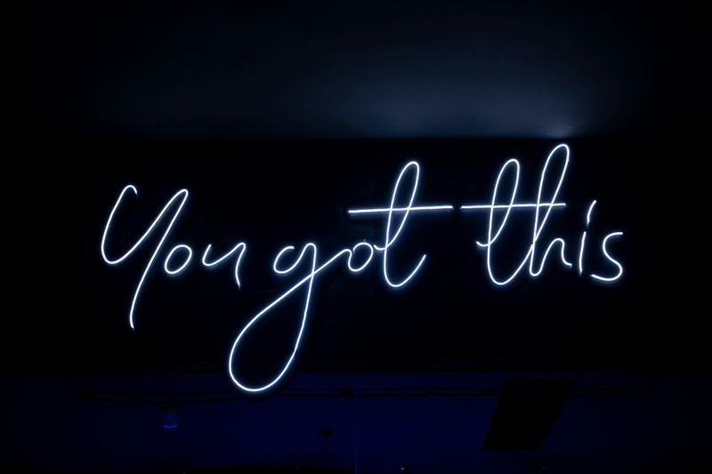 A neon light sign that says: 