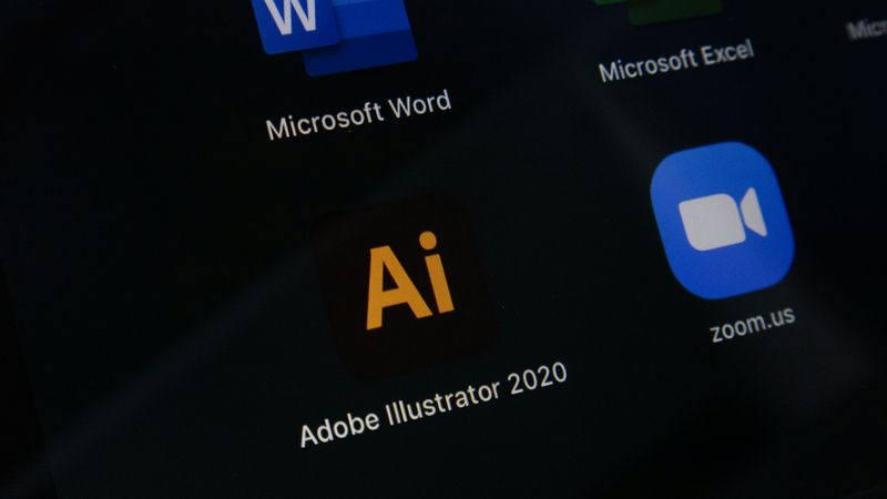 Software application icons such as Microsoft Word, Adobe Illustrator, and Zoom.