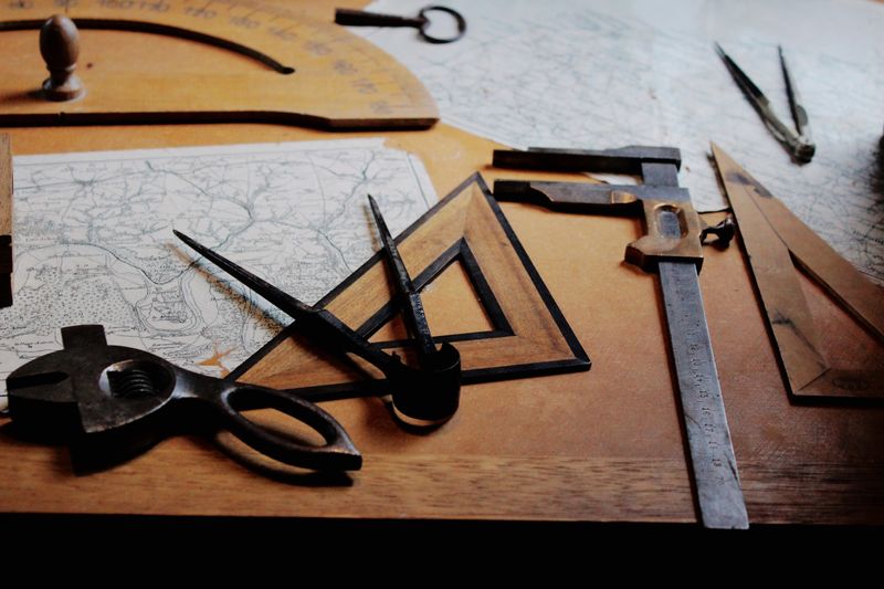 Various tools for measurement on a desk.