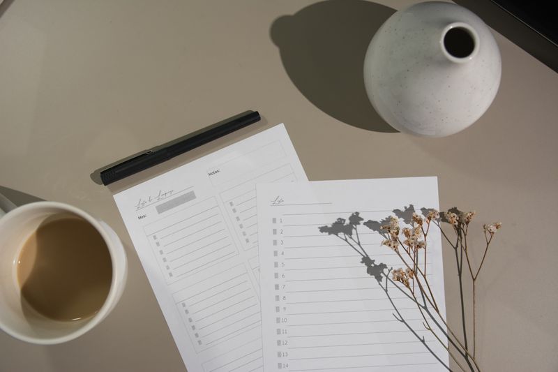 Image of a checklist and coffee cup.