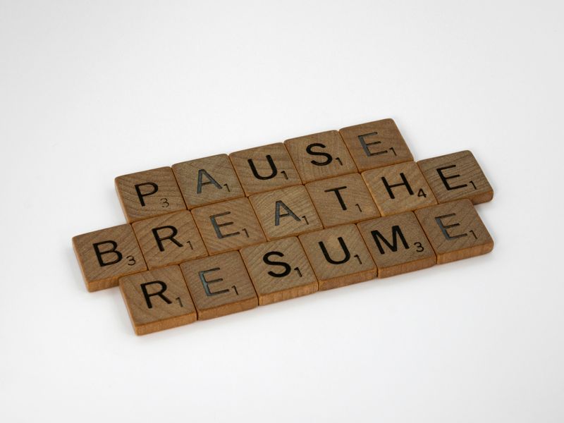 "Pause Breathe Resume" Written in Scrabble blocks