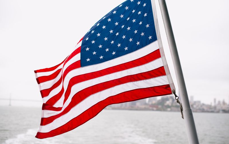 United States Flag.  Photo by Charlotte Harrison on Unsplash