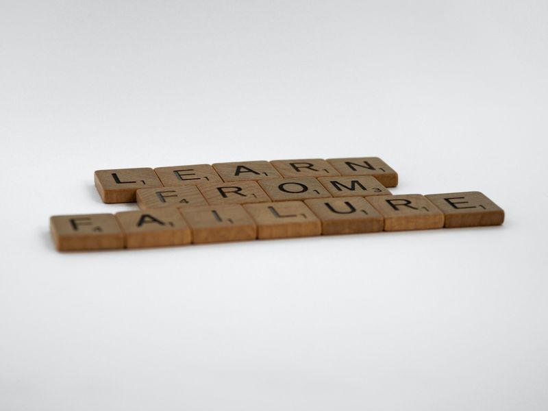 Scrabble pieces that spell, "Learn from failure".