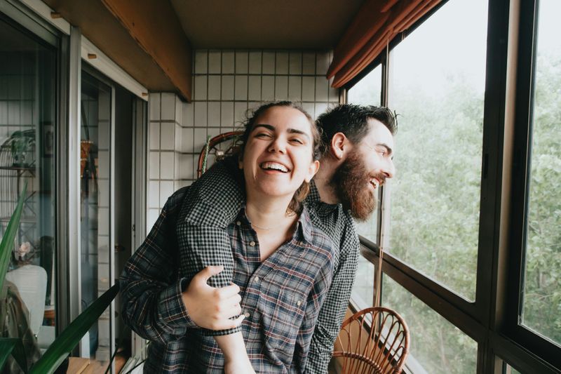 Two friends in a platonic relationship share a happy moment together.