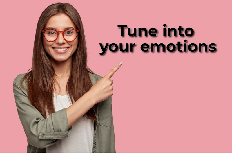 A woman pointing to the text, 'Tune into your emotions'