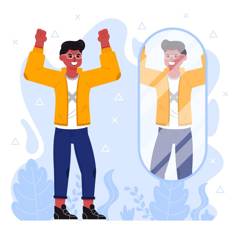 A man looking at himself confidently in the mirror.