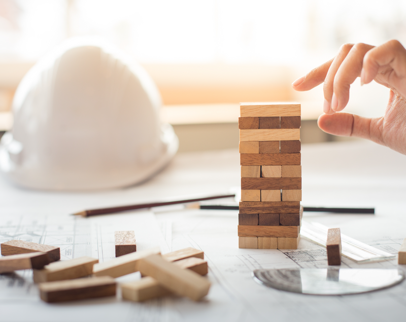 Wooden blocks stacked gradually like a tower.