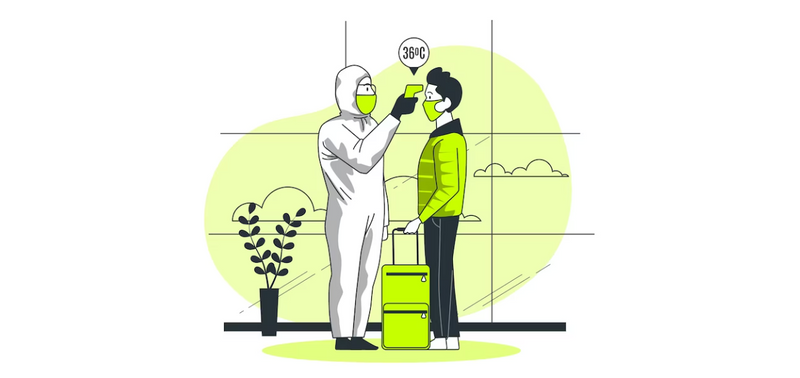 A person with full-body PPE and mask is taking the forehead temperature of male-presenting person luggage at an airport.