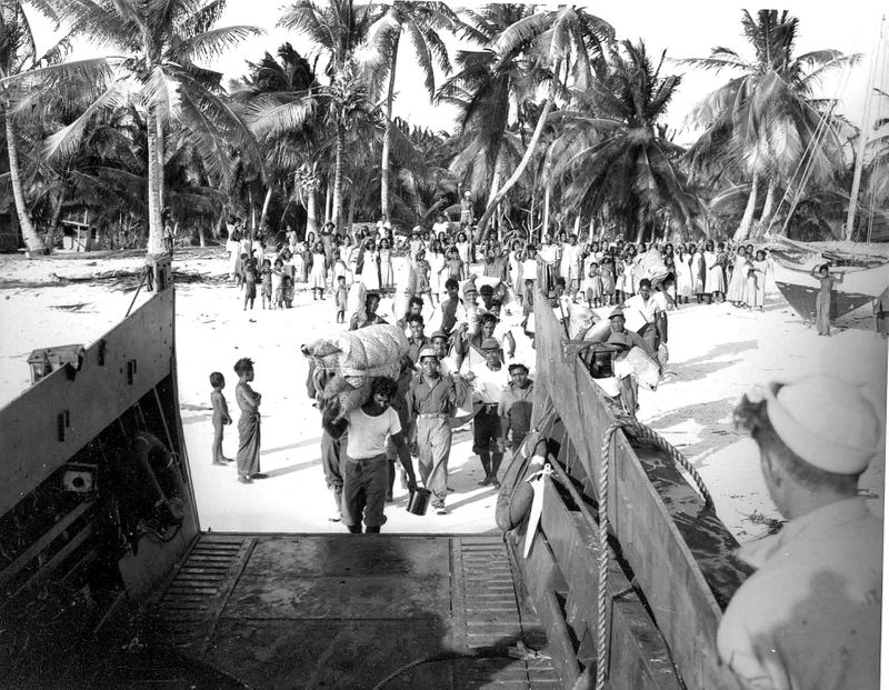 US Army soldiers landing on a beach in the Bikini Atoll.