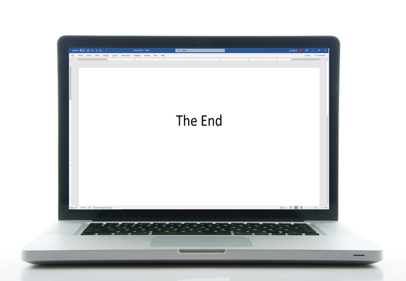 Laptop with 'The End' typed in the window.