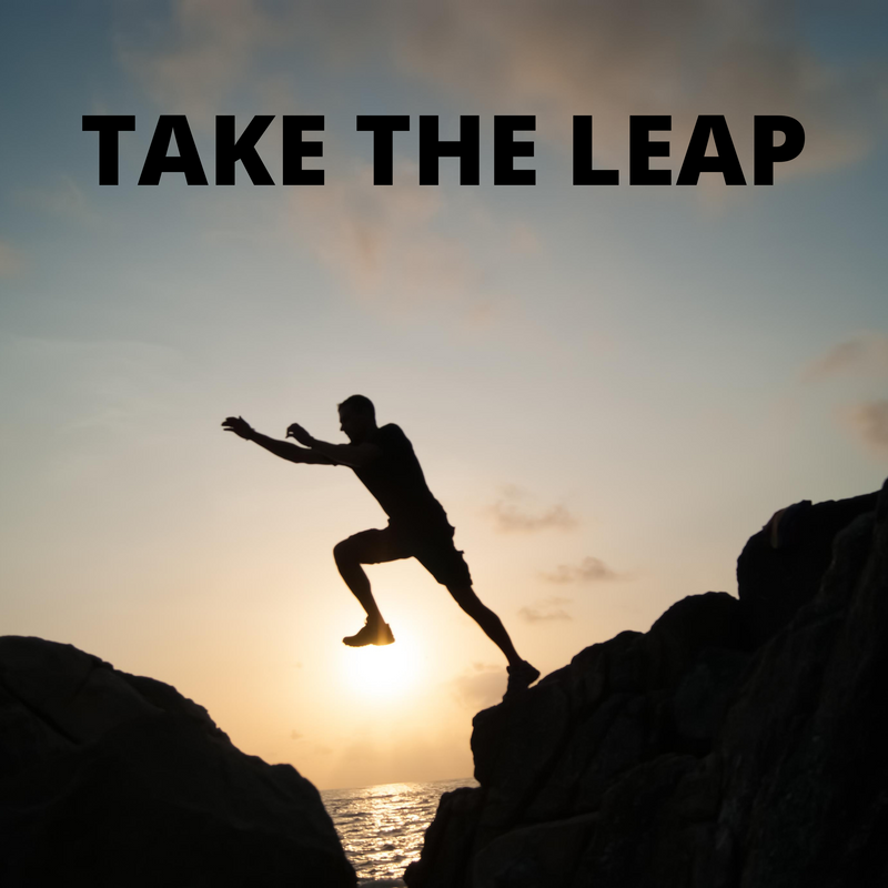 A person jumping across a gap between two large rocks. The text reads, 'Take the leap.'