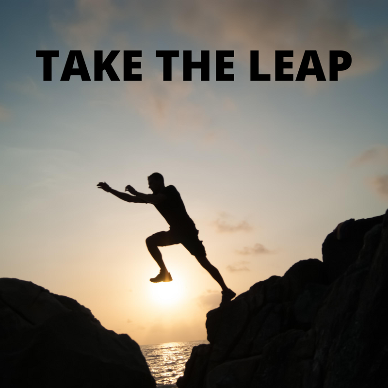 A person jumping across a gap between two large rocks. The text reads, 