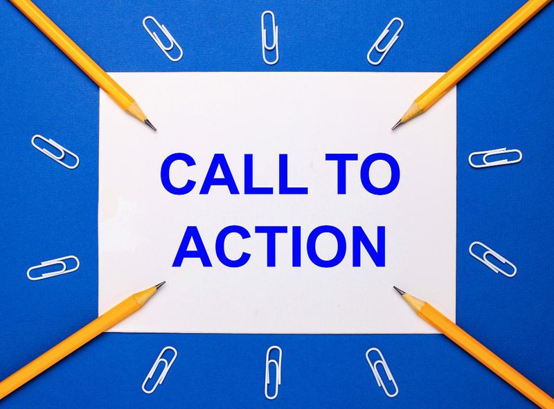 Pencils and paper clips are surrounding the text that says 'Call to action'.