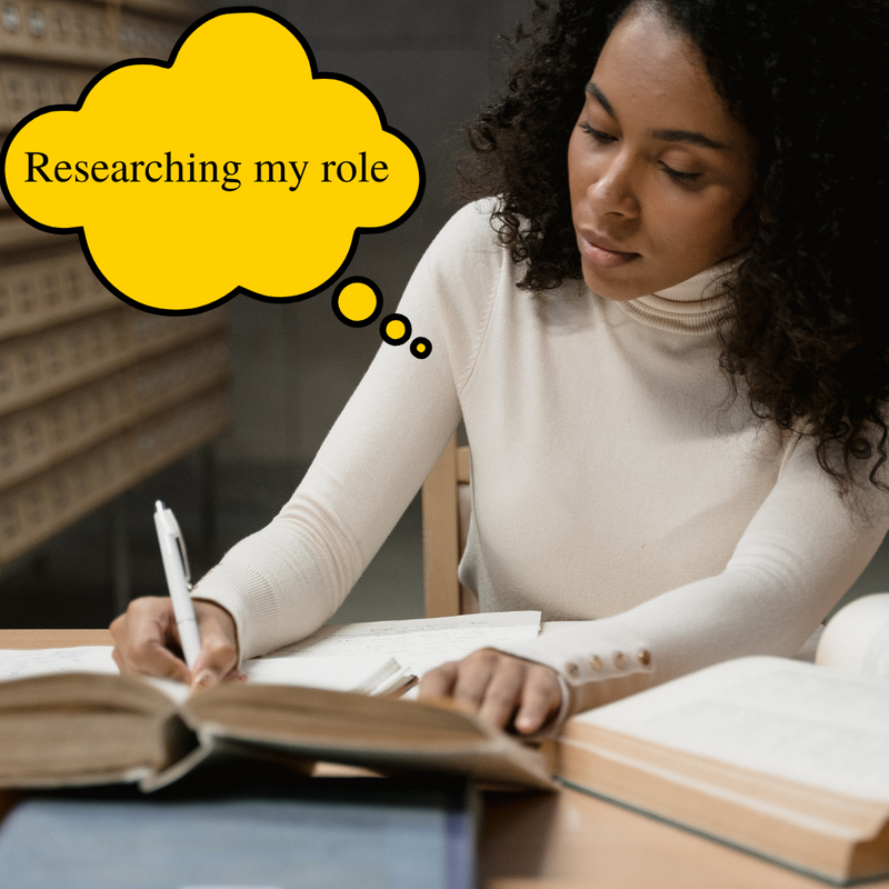 A young woman researching her role