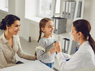 A doctor is completing a health check on a patient