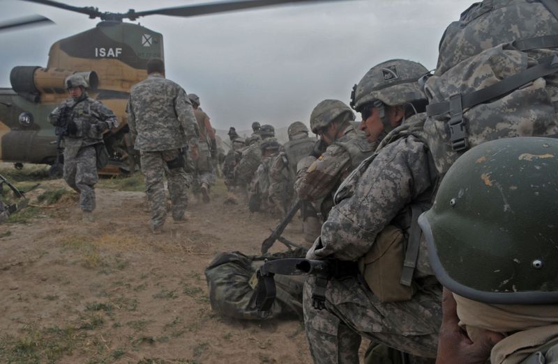 US forces on the battlefield in Afghanistan. Troops board a helicopter.