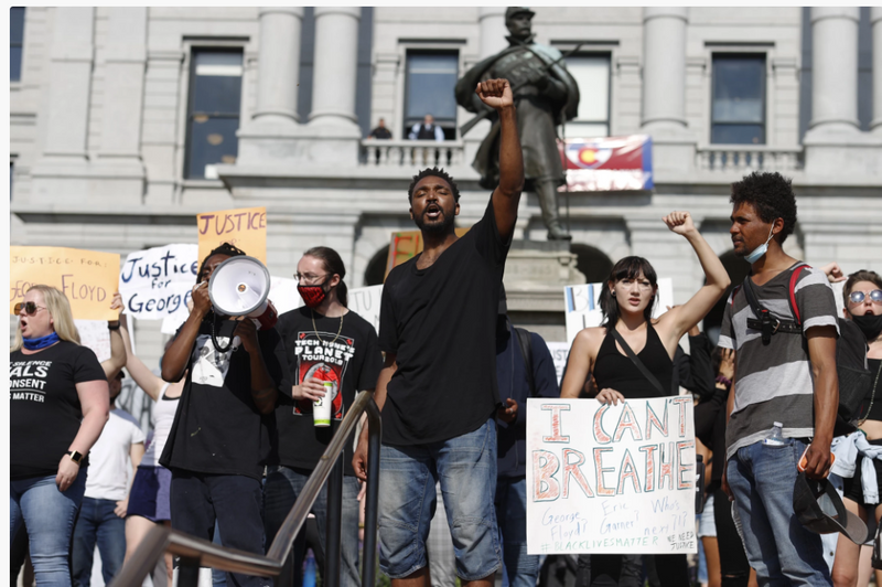 Javon Block leads a chant during a protest outside the State Capitol over the death of George Floyd.