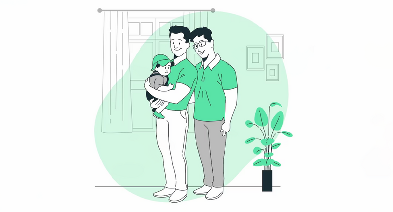 An LGBT gay masculine-presenting couple are holding a baby with a visual impairment at home while all smiling.