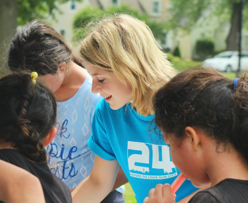 Group of four people who look like they're doing an activity together