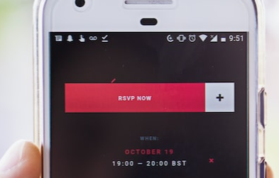 A phone screen with a black screen and bright pink link that says 'RSVP now'.