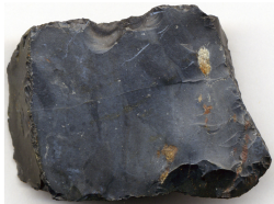 Image of a Chert sedimentary chemical rock - solid grey color made from cryptocrystalline minerals