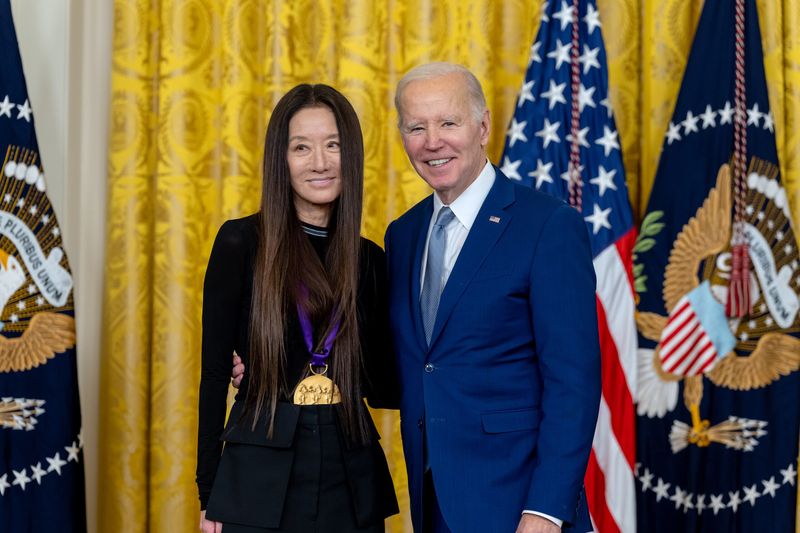 Vera Wang winning a medal from President Joe Biden.