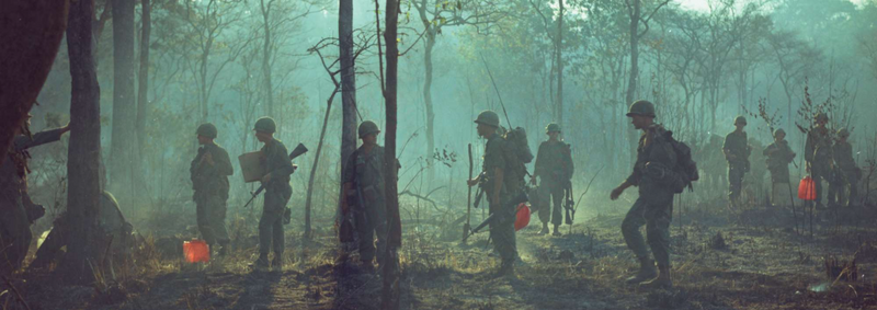 A squad of American soldiers on patrol in the jungles of Vietnam.