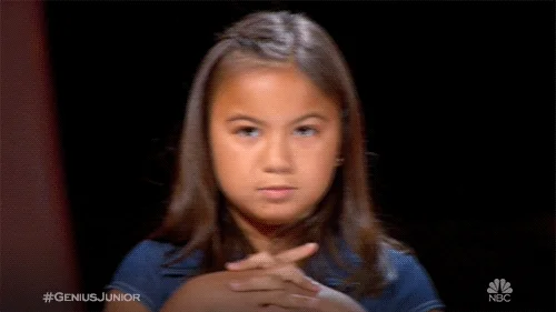 A girl cracks her knuckles.