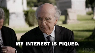 Larry David stating 'My interest is piqued.'