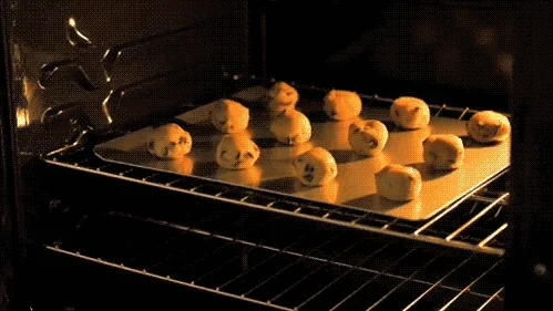 Cookies bake in an oven.