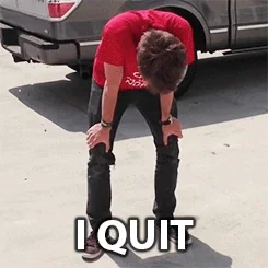 Man collapsing to group with caption "I quit"