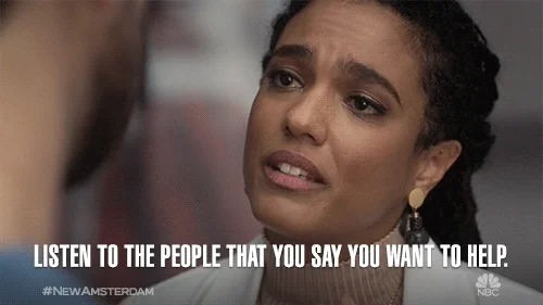 An earnest woman says, "Listen to the people that you say you want to help." 