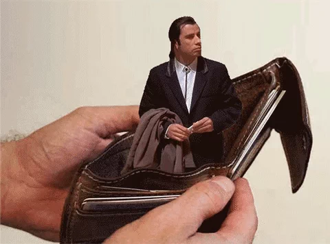John Travolta's character from Pulp Fiction appearing inside an open wallet while shrugging.