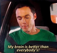 Sheldon from The Big Bang Theory holds up a bowling ball and says, "My brain is better than everybody's!"
