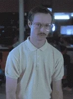 Kip dynamite from Napoleon Dynamite movie doing pulling arm down motion, stating yes.