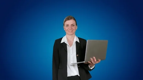 A woman with multiple functional arms trying to take on work tasks.