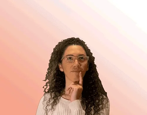 A teacher thinking while light bulb goes off above her head.