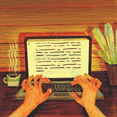A person's hands typing on a computer.