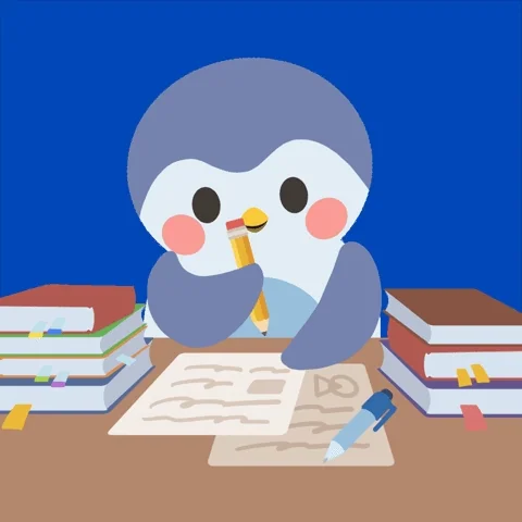A cartoon penguin studying at a desk.