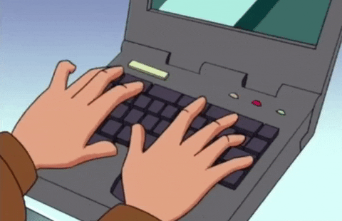 Someone typing something on their laptop