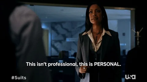 African-American woman wearing a three piece suit.  Caption reads: This isn't professional, this is personal