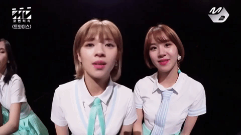 A k-pop singer making vowel sounds